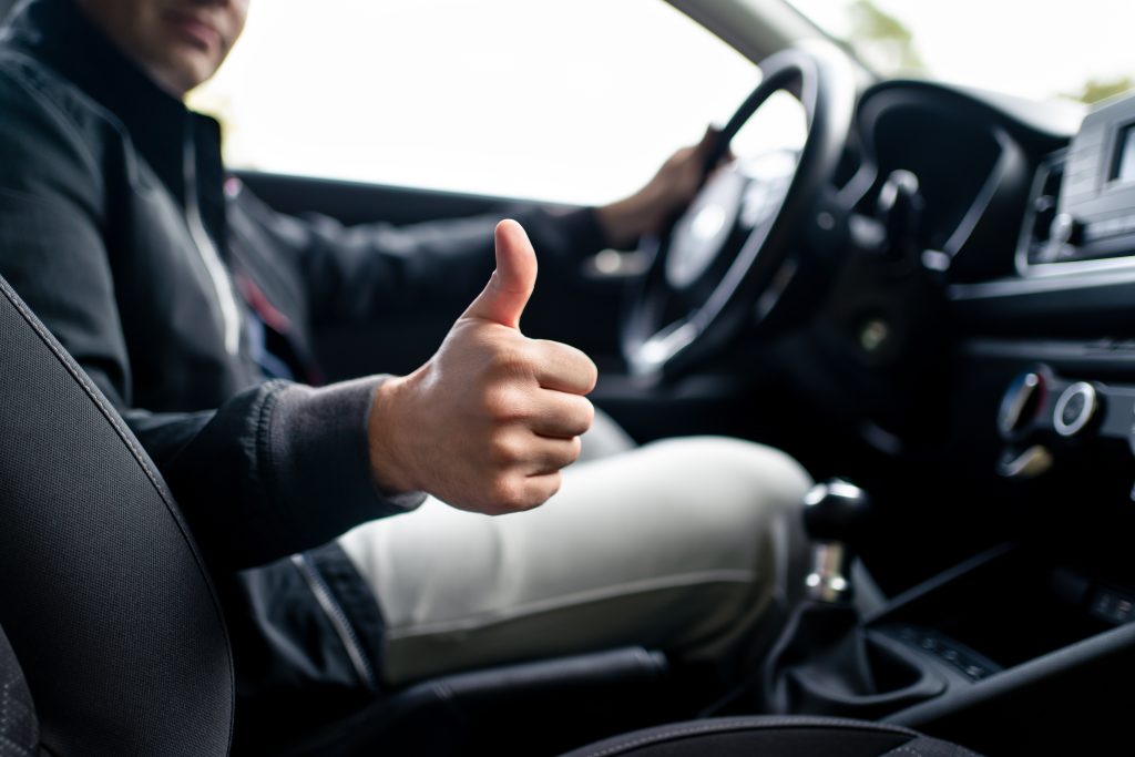 Happy,Driver,In,Car,,Thumbs,Up ,Man,Driving ,Smiling,Positive