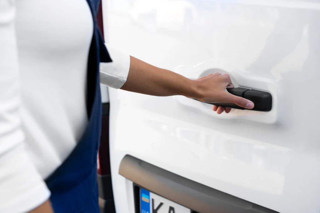 side view woman opening van s door