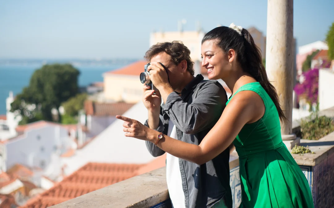 portrait loving couple taking photos summer sea city happy man woman standing city upland enjoying rest man taking photos faraway sea love vacation travelling concept